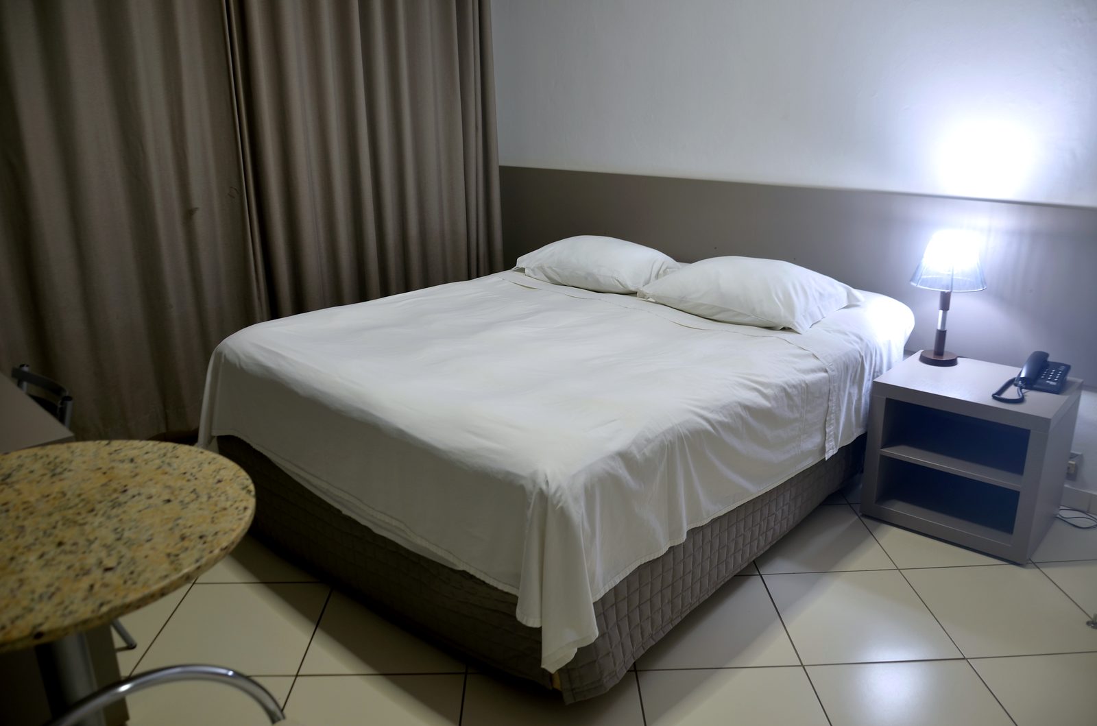 Quarto Super Luxo do Treville Hotel Carazinho com cama Queen Size ampla